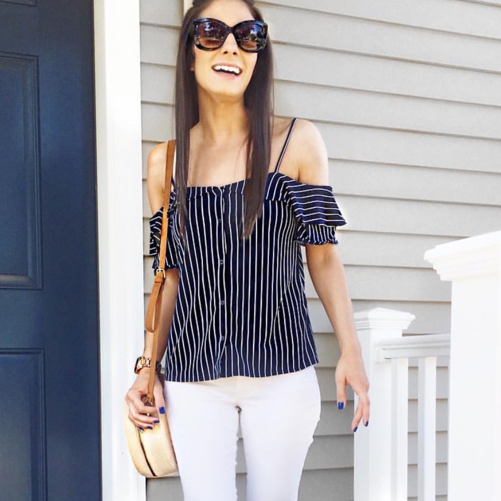 Off the shoulder tank. Buttons all the way down.